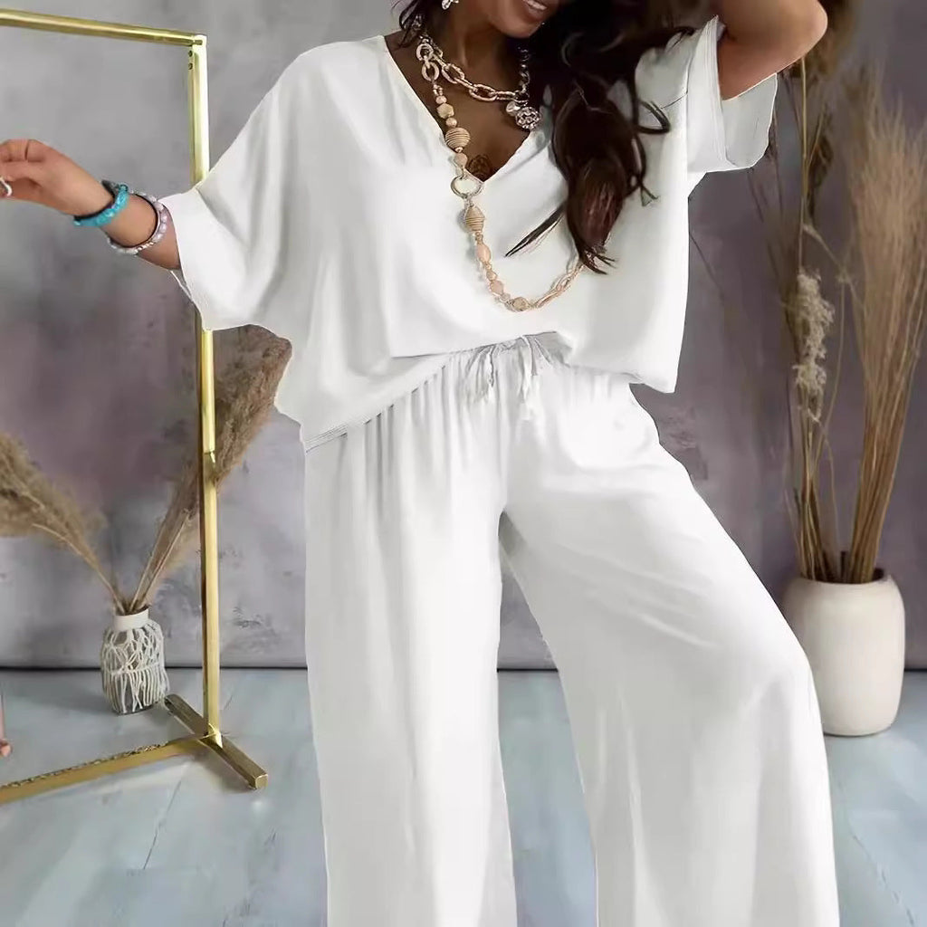 Women's elegant jumpsuit with V-neck and wide leg, size