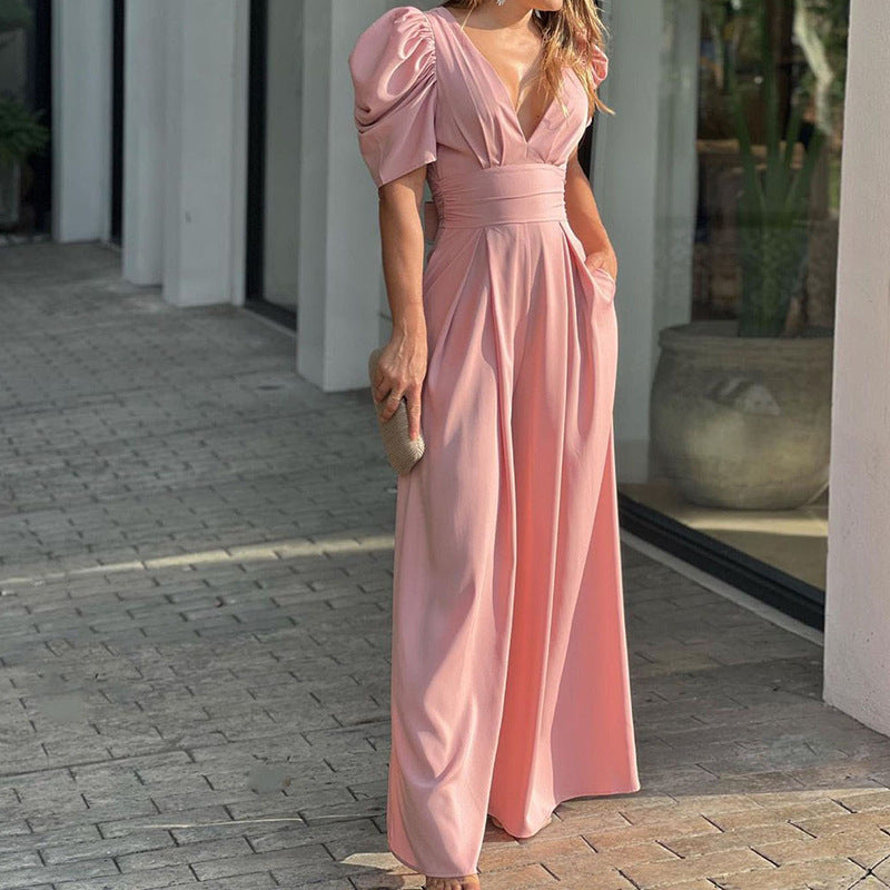 Women's elegant jumpsuit with voluminous puff sleeves and deep V-neck, size [size]