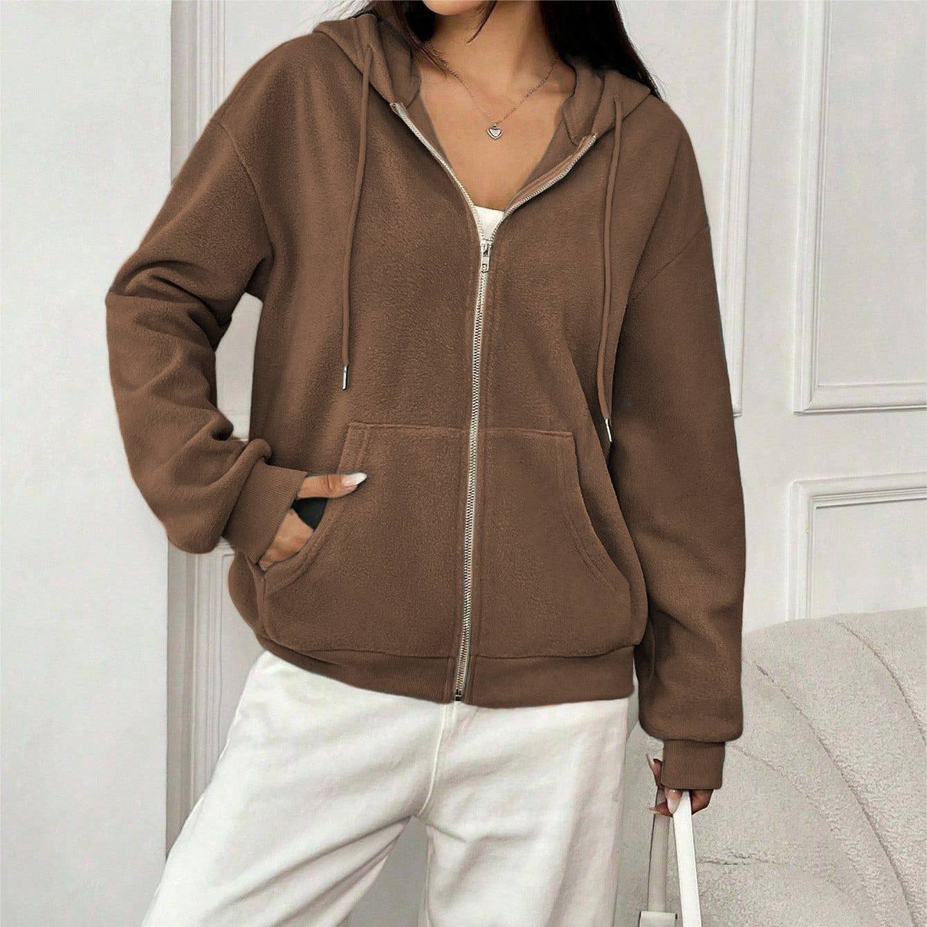 Women's fleece jacket with hood and practical pockets, size
