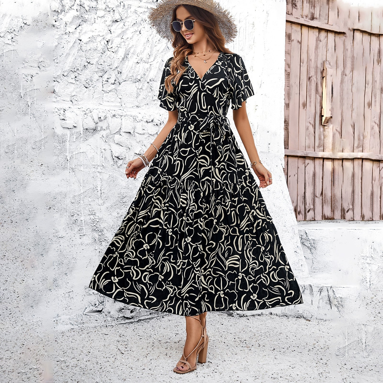 Women's wrap dress with voluminous sleeves and playful pattern, size S