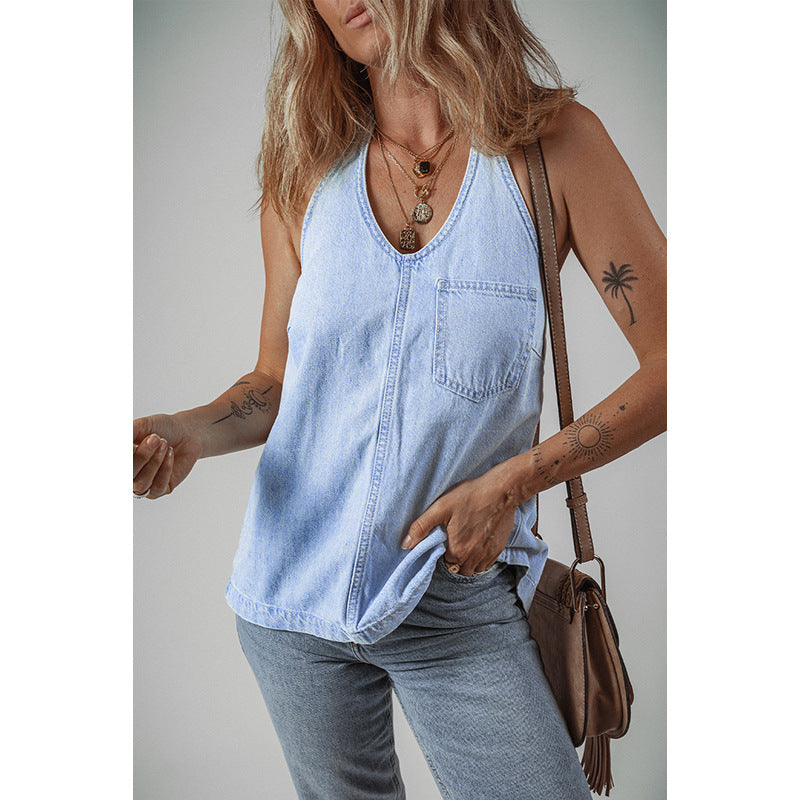 Women's sleeveless denim top with practical chest pockets, size