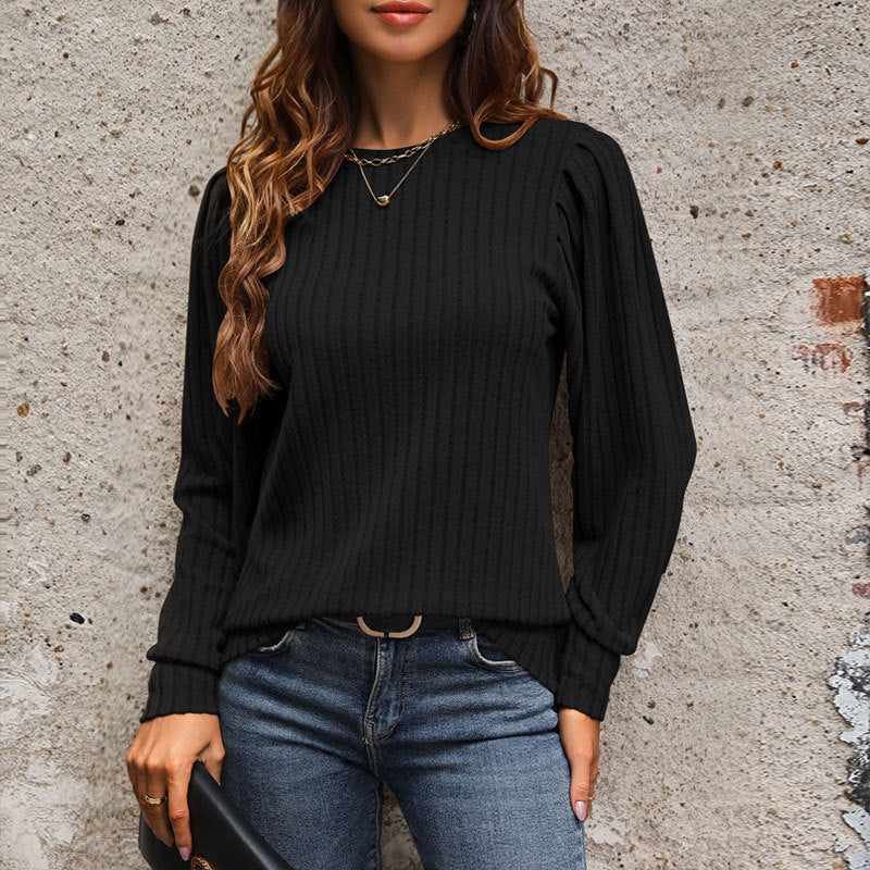 Women's knit sweater with elegant ruffle details and textured fabric, size S