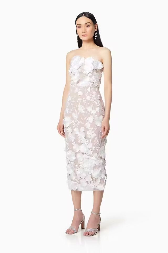 Women's dress with floral embroidery design and elegant, fitted cut, size S