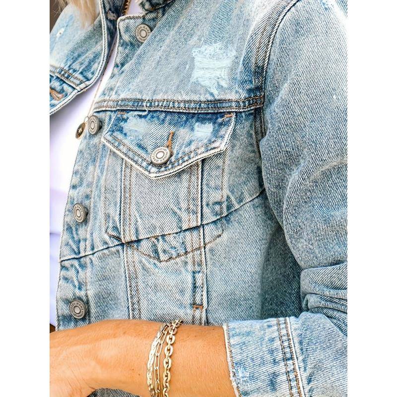 Women's denim jacket with casual distressed details and a modern cut, size S