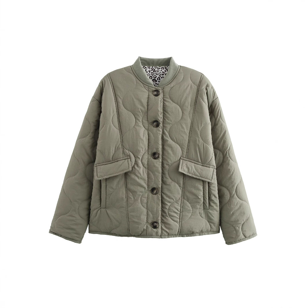 Women's quilted jacket in an elegant design with practical button closure and side pockets, size S