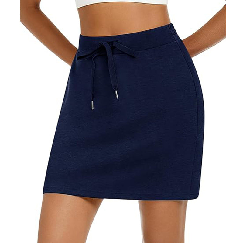 Women's sporty mini skirt with adjustable drawstring and side pockets, size