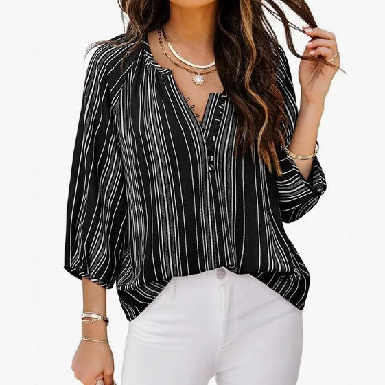 Women's elegant tunic blouse with sophisticated stripes, size
