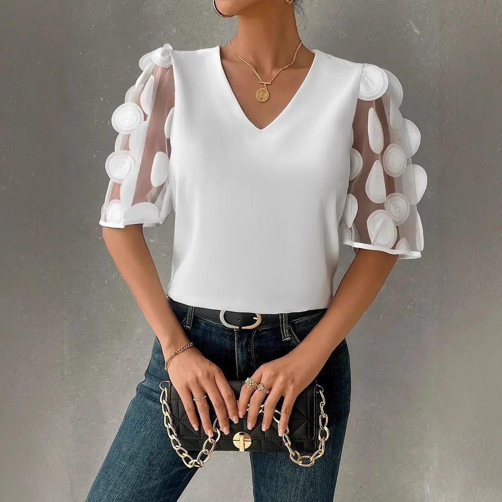 Damen Bluse mit transparenten Puffärmeln und eleganten Detail GR