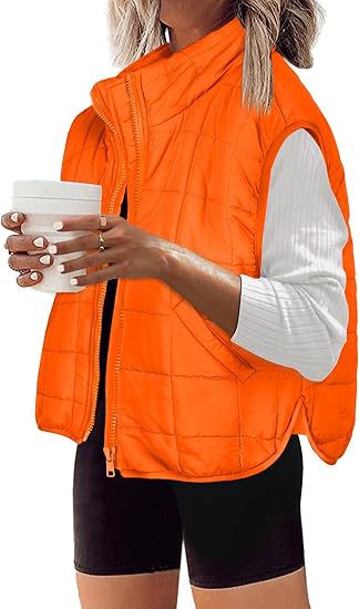 Women's quilted vest with high collar and practical side pockets, size