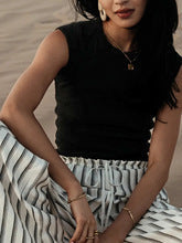 Women's sleeveless ribbed shirt with a figure-hugging cut, size [size missing]