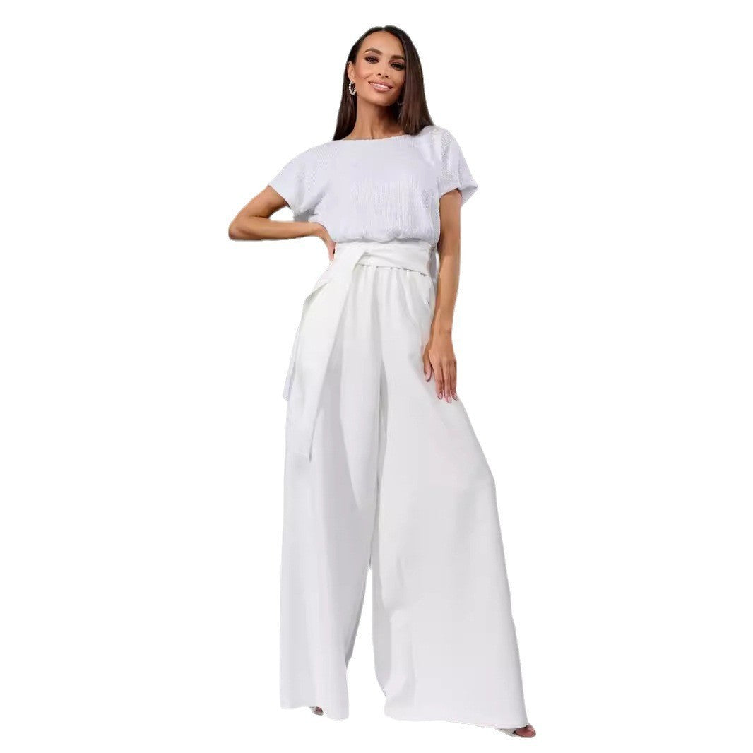 Women's glamorous jumpsuit with glittery top and wide-legged trousers, size
