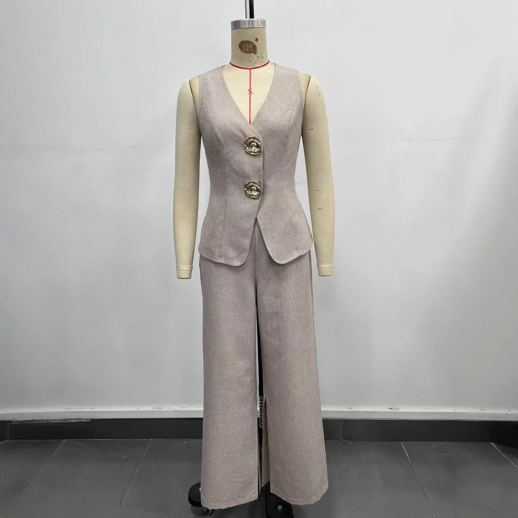 Women's elegant ensemble consisting of a sleeveless blazer and wide-leg trousers, size S