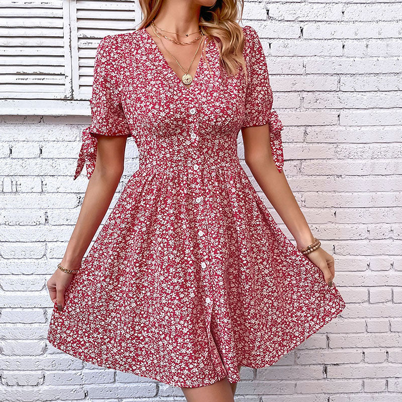 Women's blouse dress with floral patterns and playful ruffles, size