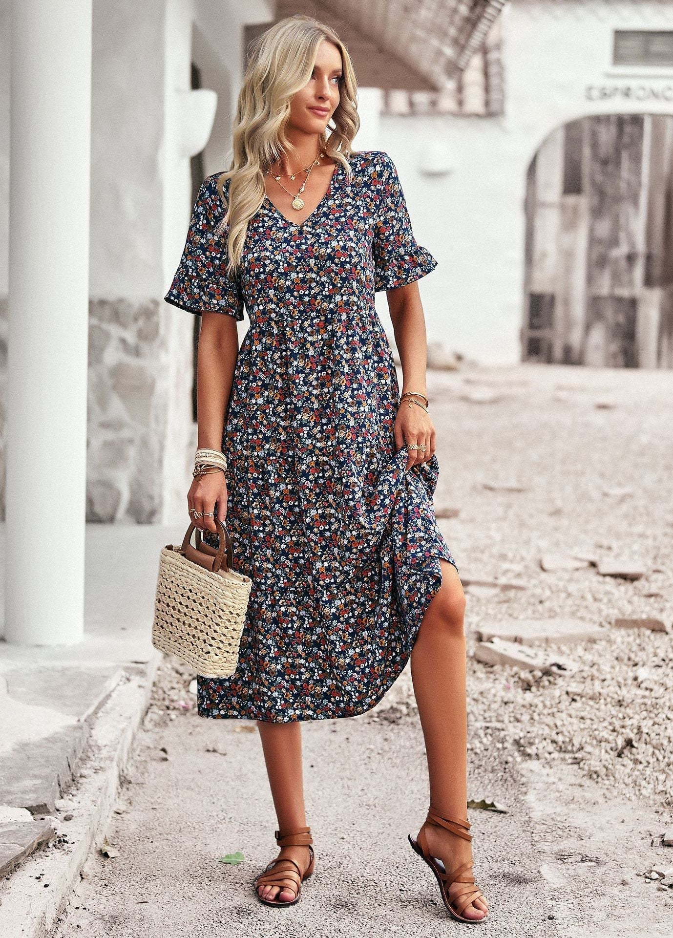 Women's midi dress with floral pattern and playful V-neck, size