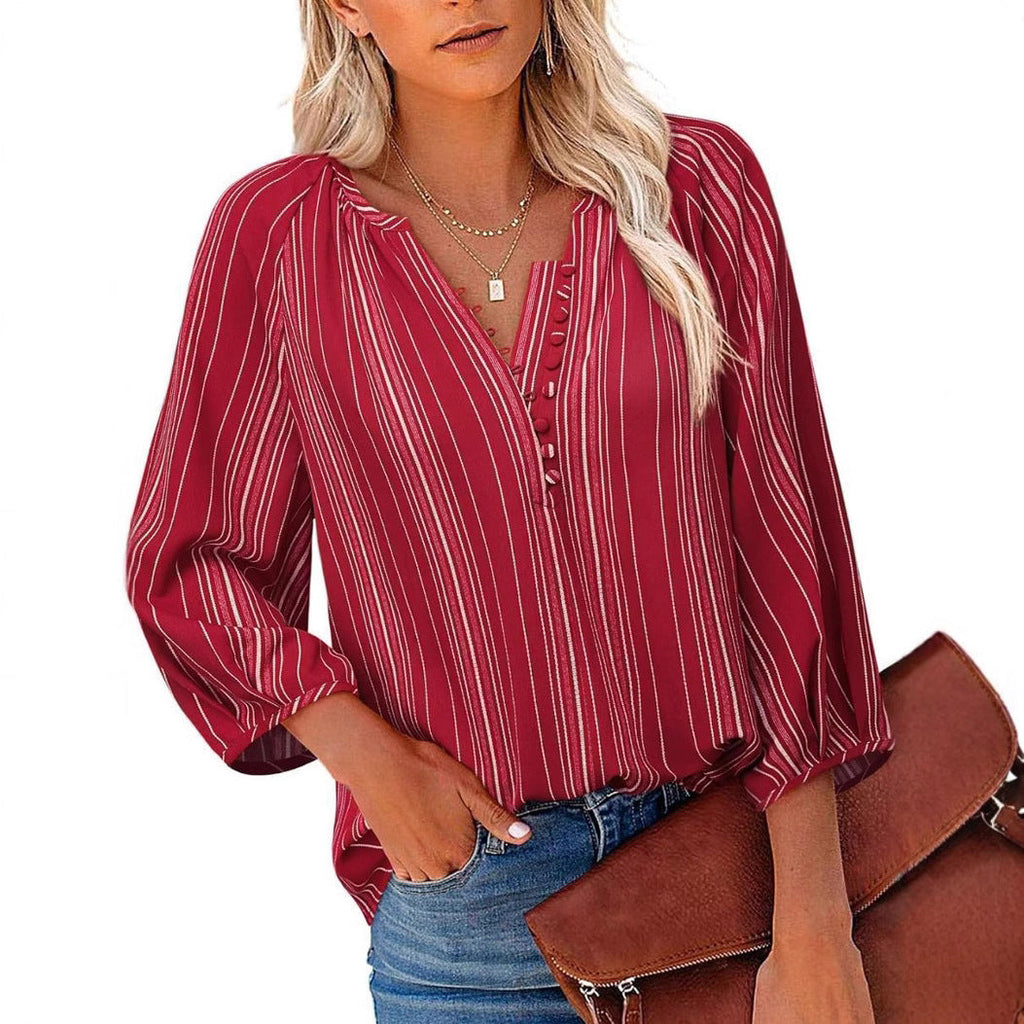 Women's elegant tunic blouse with sophisticated stripes, size