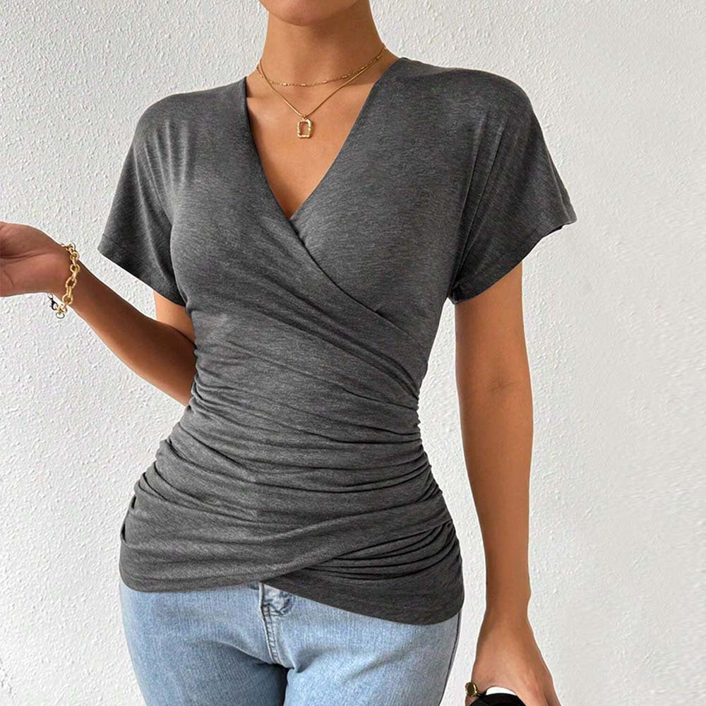 Women's wrap top with sophisticated ruching details, size S
