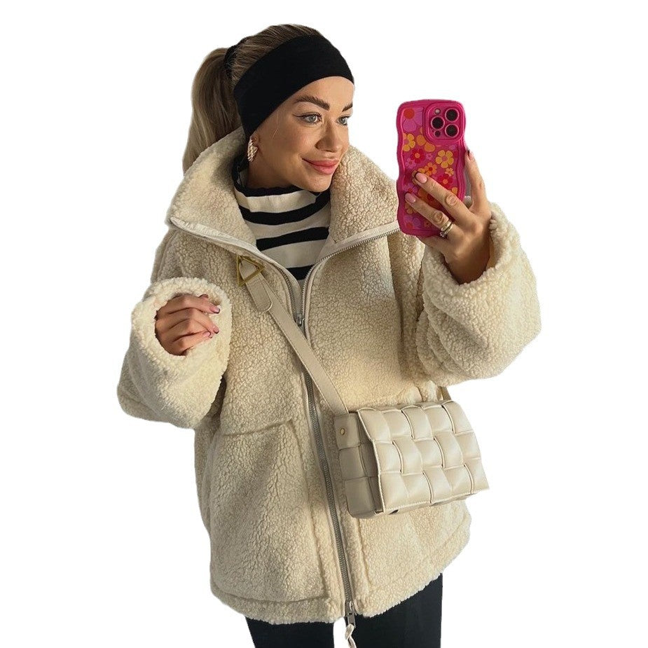 Women's cozy fleece jacket with high collar and practical pockets, size