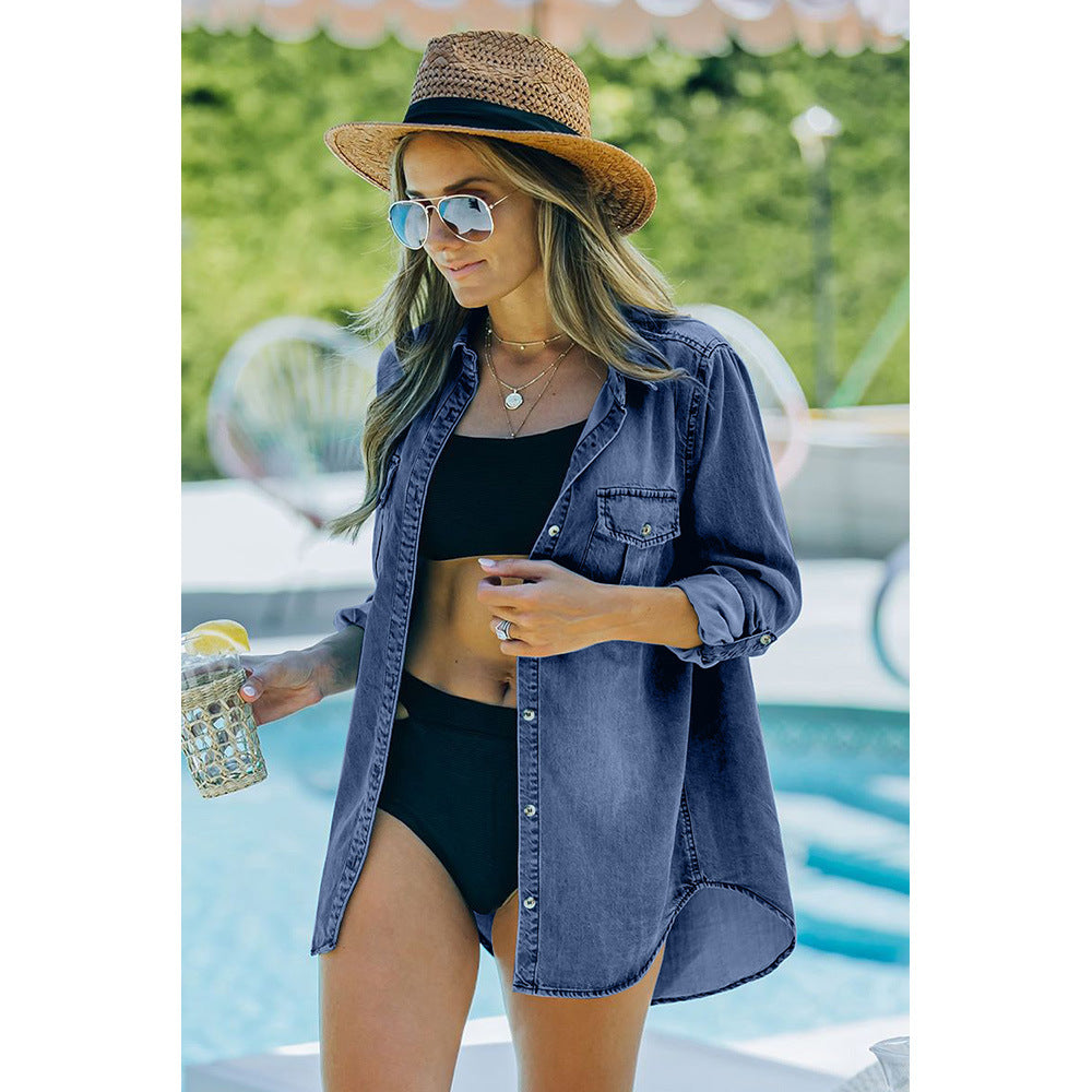 Women's denim shirt blouse with practical chest pockets and classic cut, size S