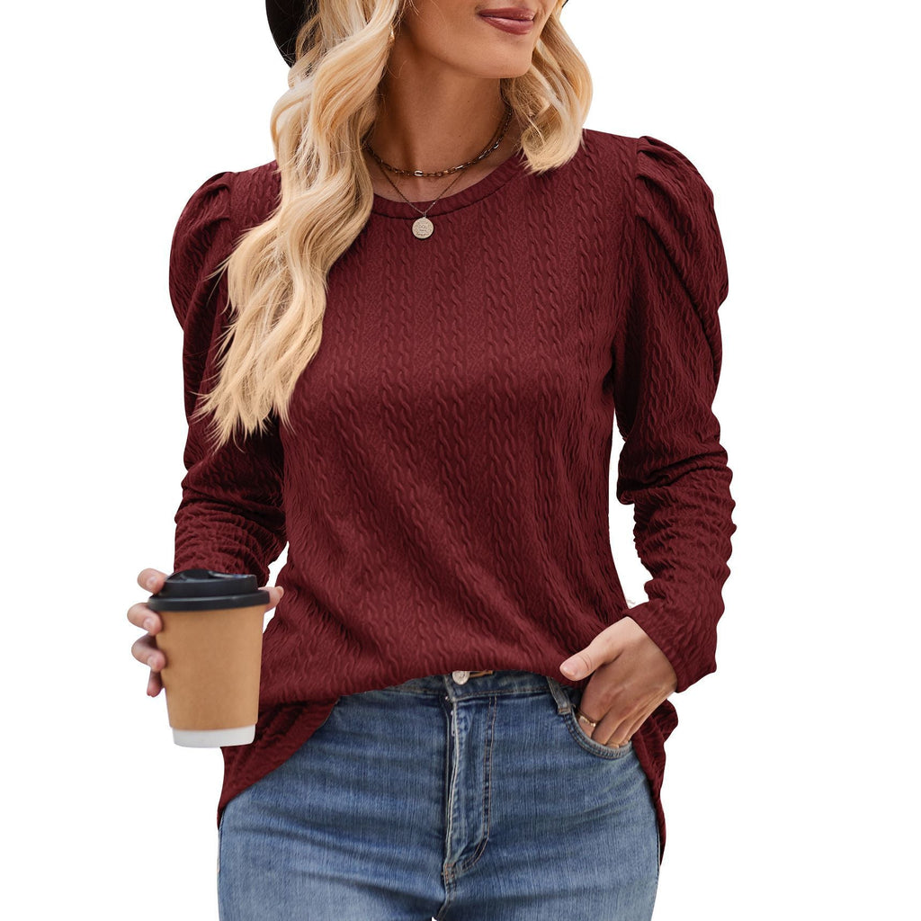 Women's elegant long-sleeved shirt with a textured pattern and puff sleeves, size