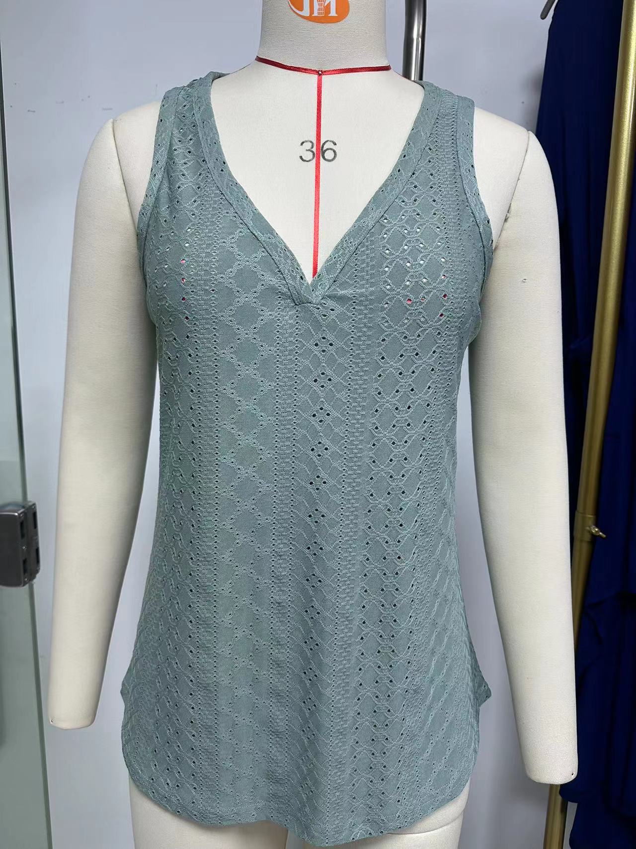 Women's sleeveless lace top with V-neck and decorative openwork patterns, size