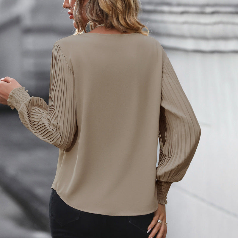 Damen Bluse mit voluminösen Plisseeärmeln und elegantem V-Ausschnitt GR