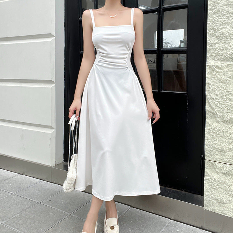 Women's elegant spaghetti strap midi dress with a figure-hugging silhouette and sophisticated draping, size [size]