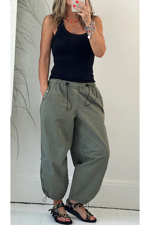 Women's casual pleated trousers made of breathable material, size S