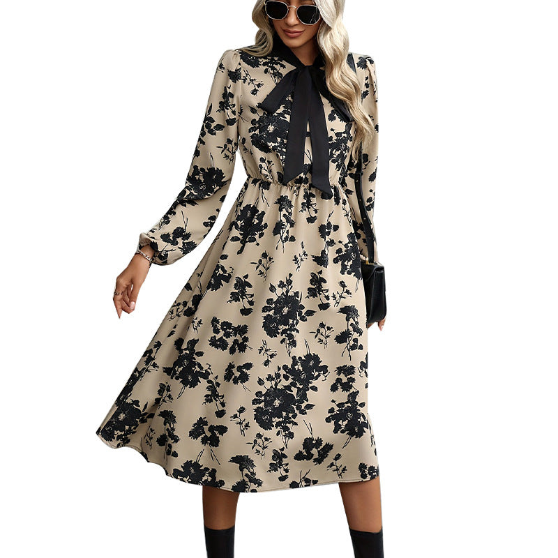 Women's elegant midi dress with floral pattern and bow details, size