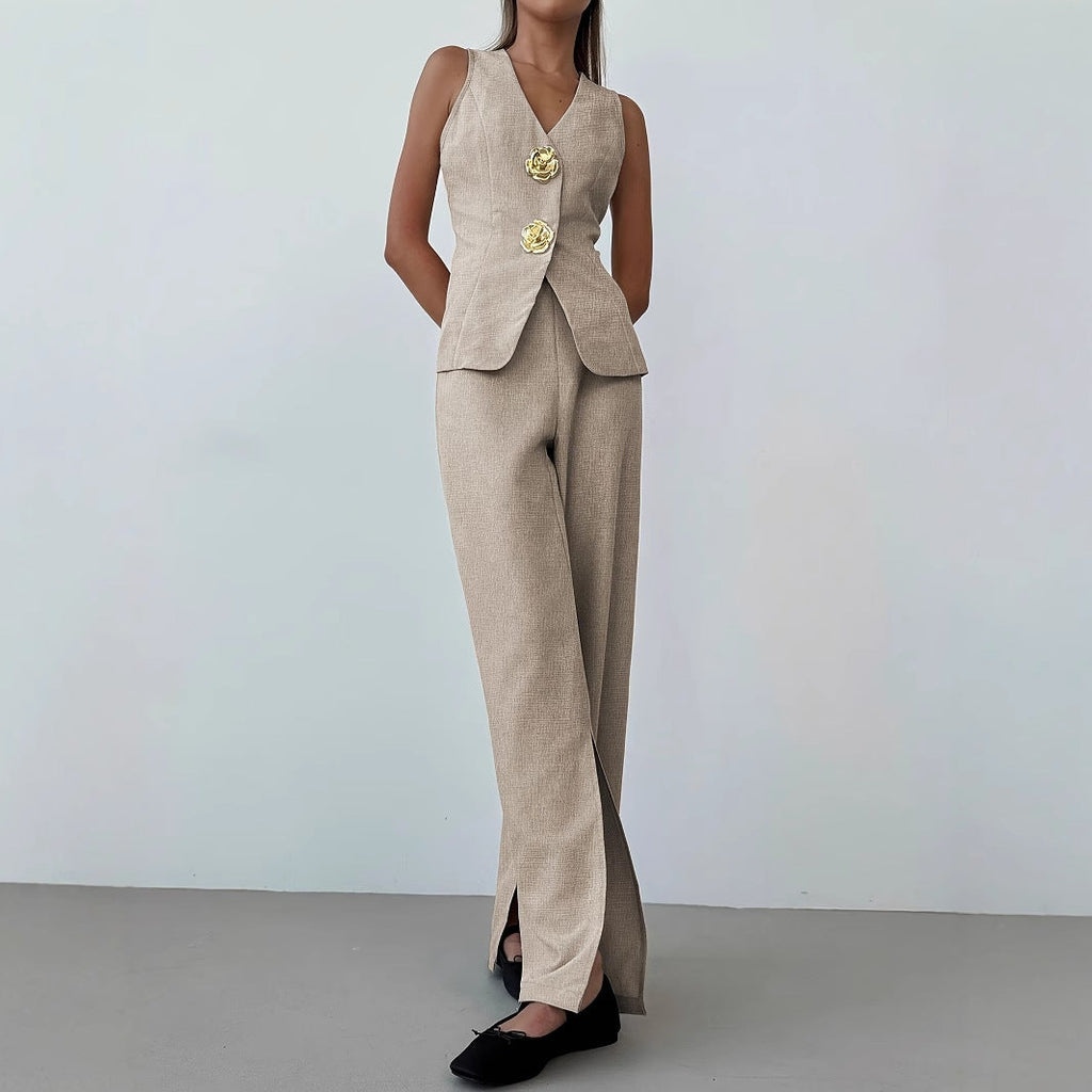 Women's elegant ensemble consisting of a sleeveless blazer and wide-leg trousers, size S