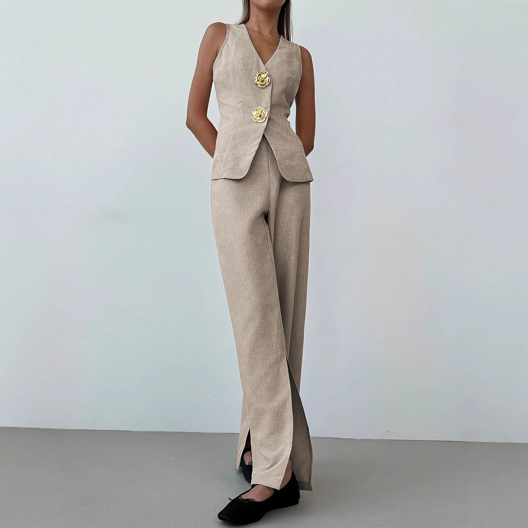 Women's elegant ensemble consisting of a sleeveless blazer and wide-leg trousers, size S