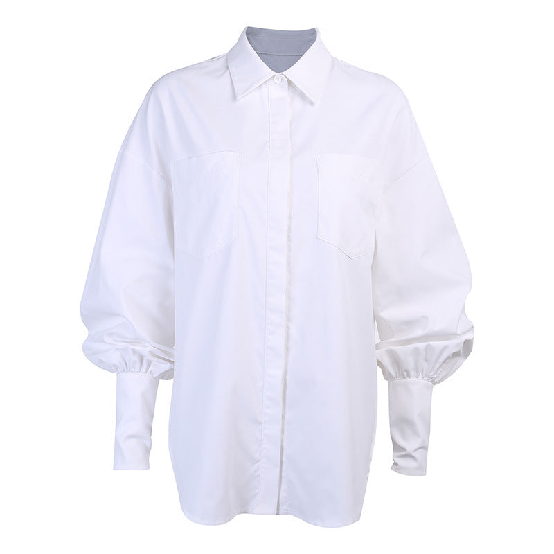 Women's shirt blouse with a stylish oversized cut and trendy puff sleeves, size [size]