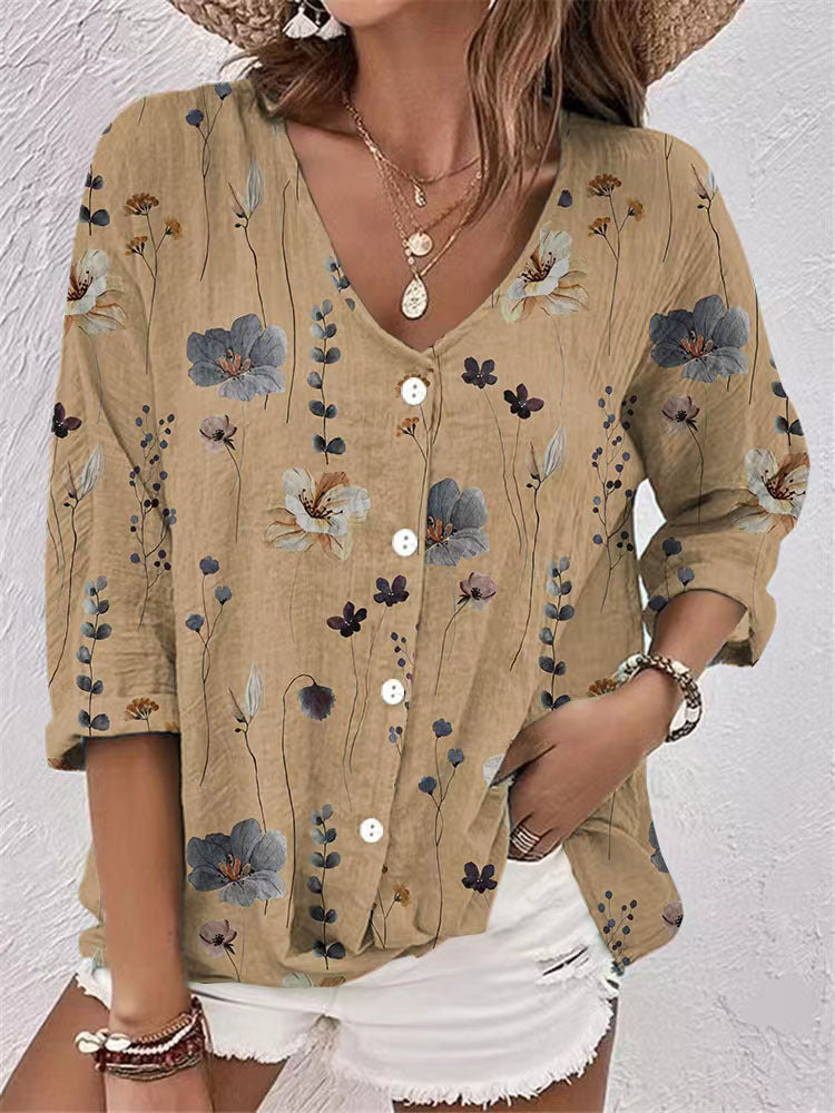Women's blouse with floral print and modern button design, size