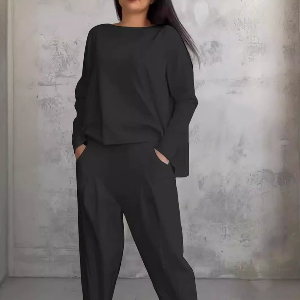 GR | Solid color slim-fit trouser suit with round neckline