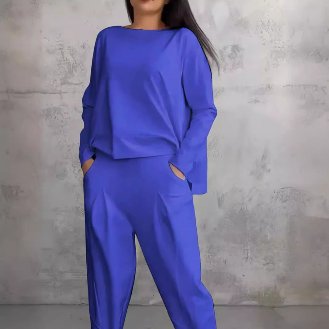 GR | Solid color slim-fit trouser suit with round neckline