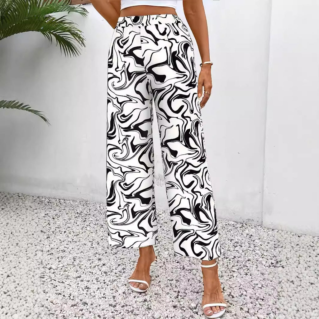 Women's wide-leg palazzo trousers with a modern marble print and elasticated waistband, size S