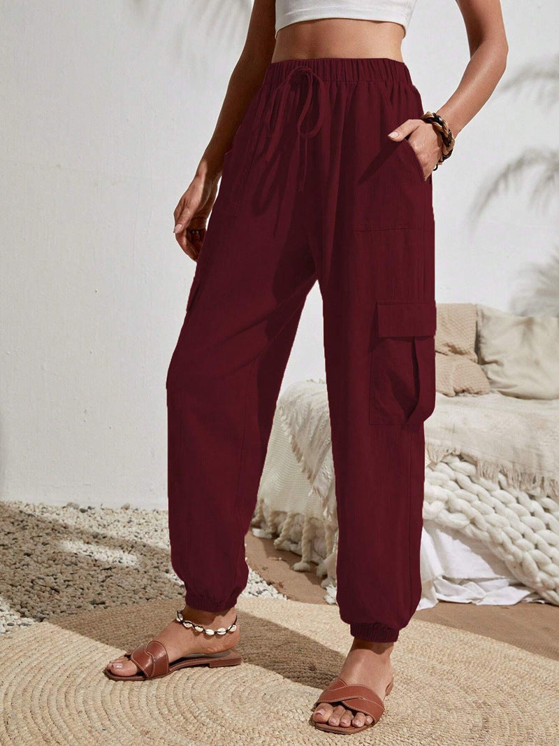 Women's cargo trousers with elasticated waistband and practical side pockets, size S