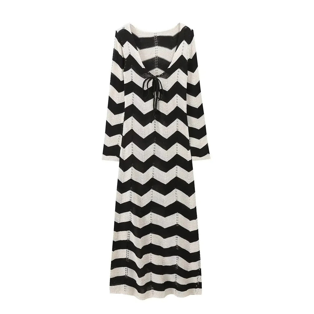 Women's knitted dress with a modern zigzag pattern and deep V-neck, size [size missing]