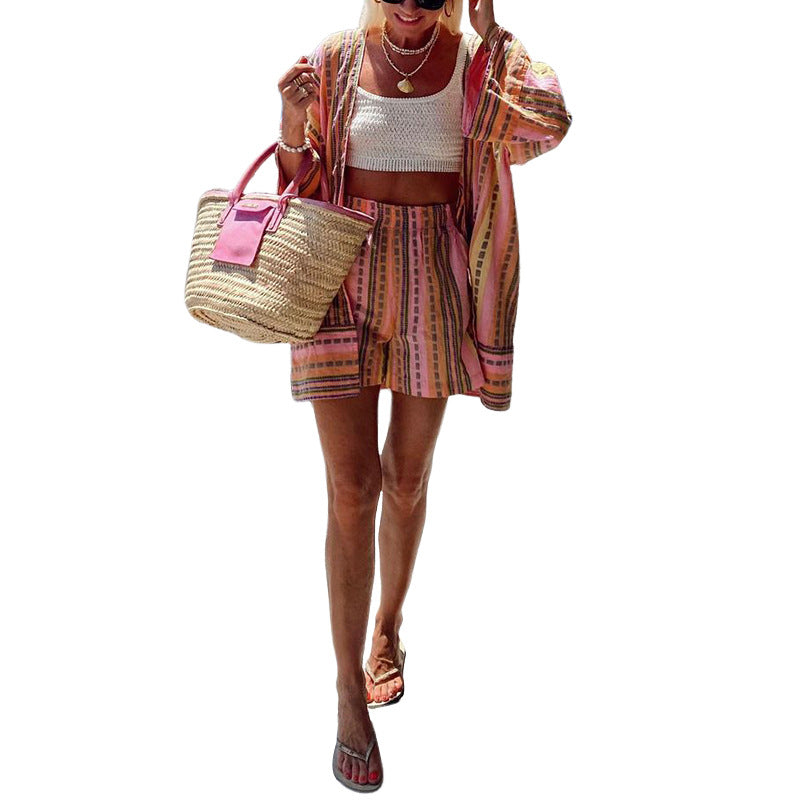 Women's casual top with a relaxed knit look and striped shorts, size S
