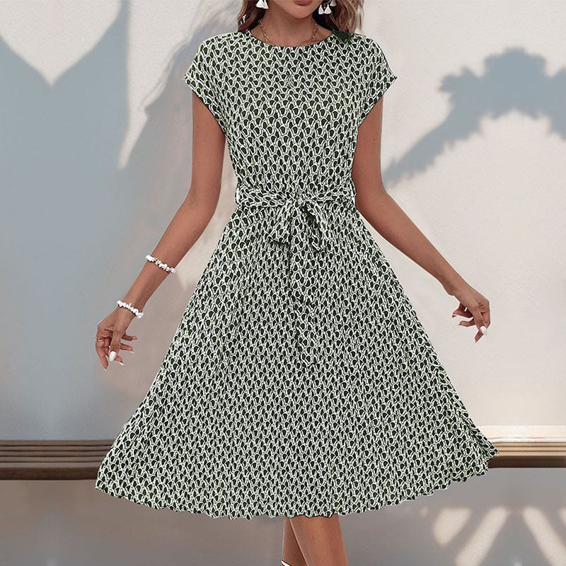 Women's midi dress with a sophisticated waist belt and playful pattern, size