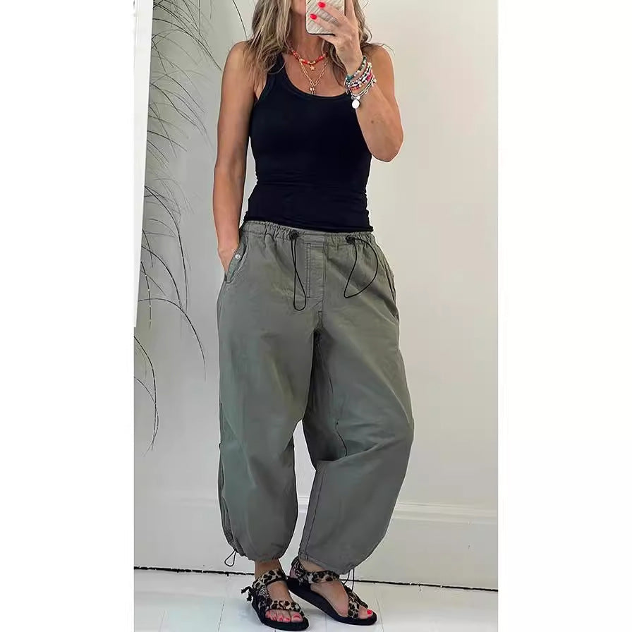 Women's casual pleated trousers made of breathable material, size S