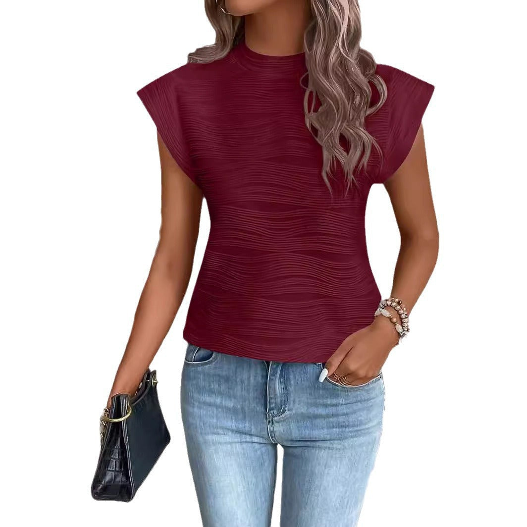 Women's elegant top with structured puff sleeves and high neckline, size S