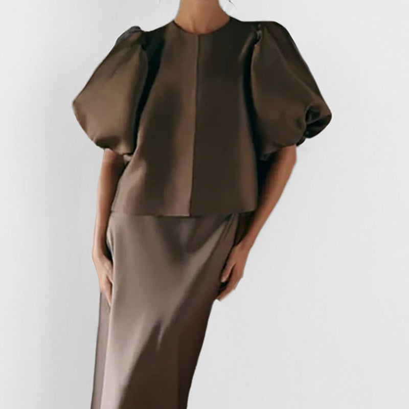 Women's blouse with voluminous puff sleeves and modern design, size S