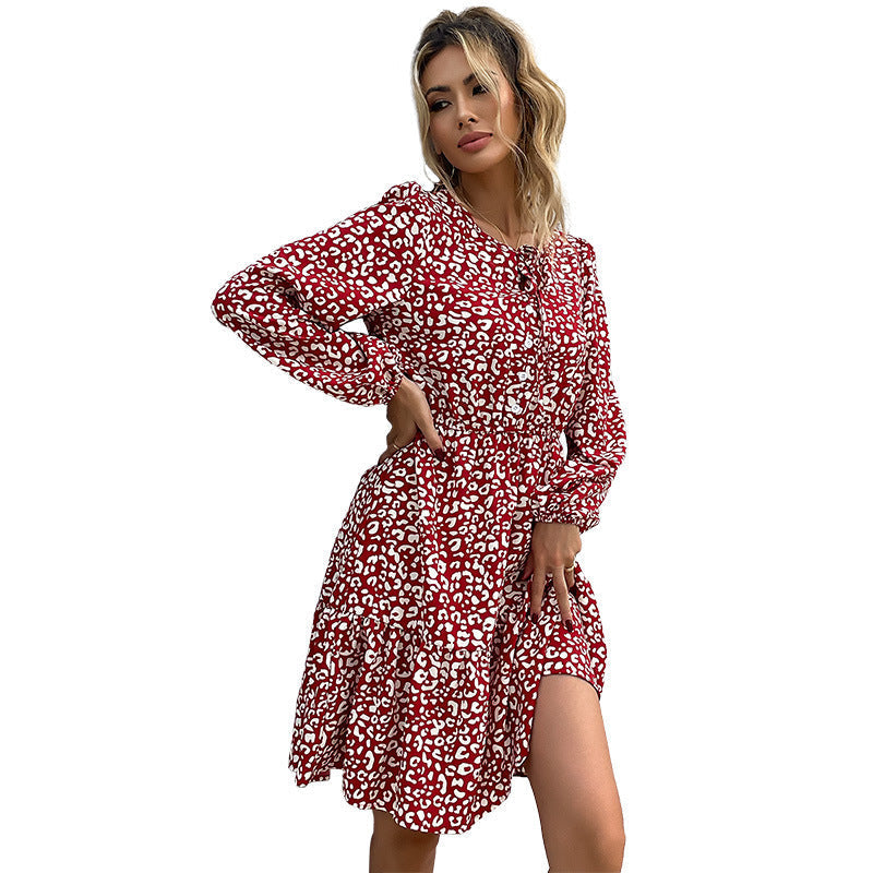 Women's midi dress with floral animal print and elegant button placket, size