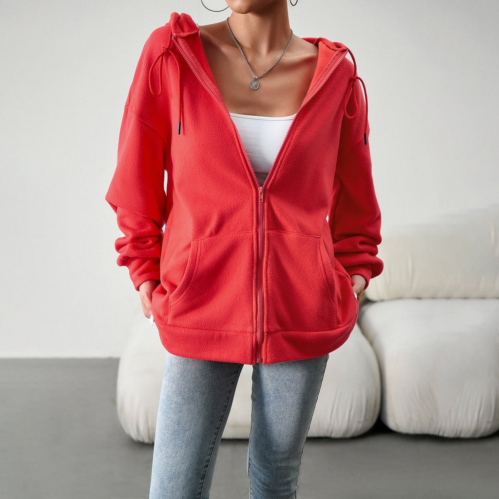 Women's fleece jacket with practical pockets and adjustable hood, size S