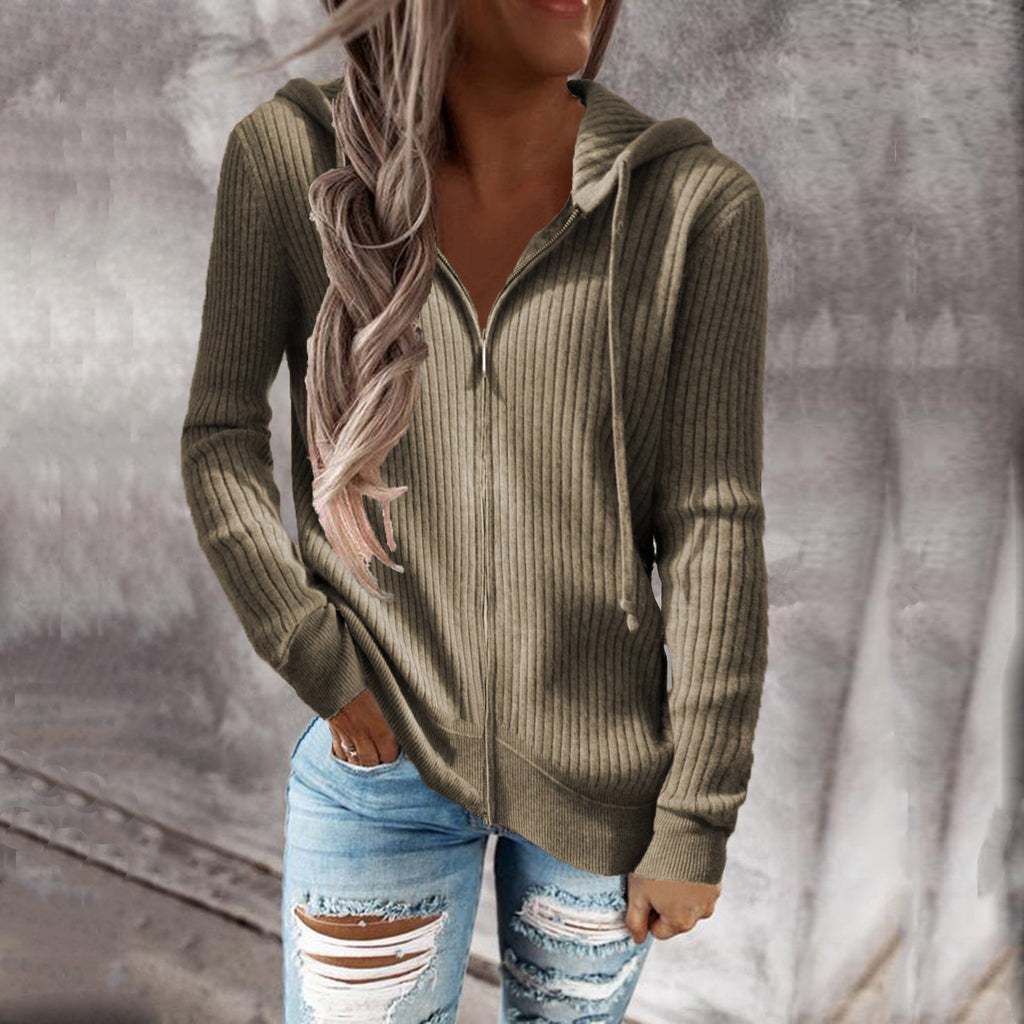 Women's sporty hooded jacket with structured ribbed texture and practical pockets, size S