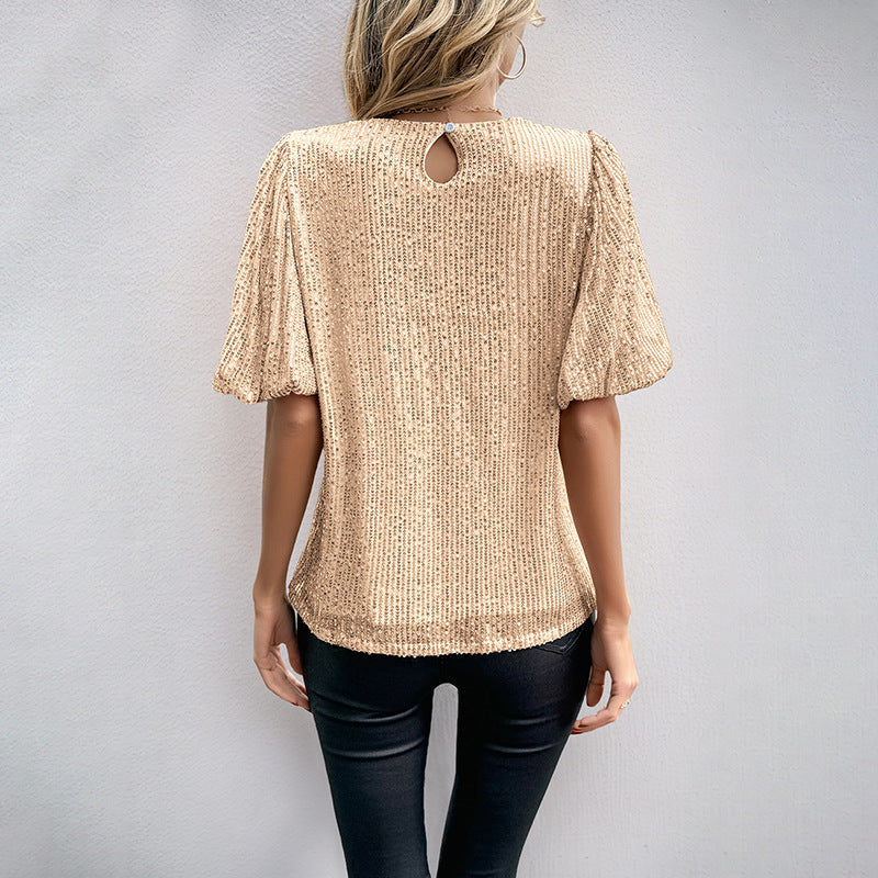 Women's blouse with voluminous puff sleeves and textured fabric, size S