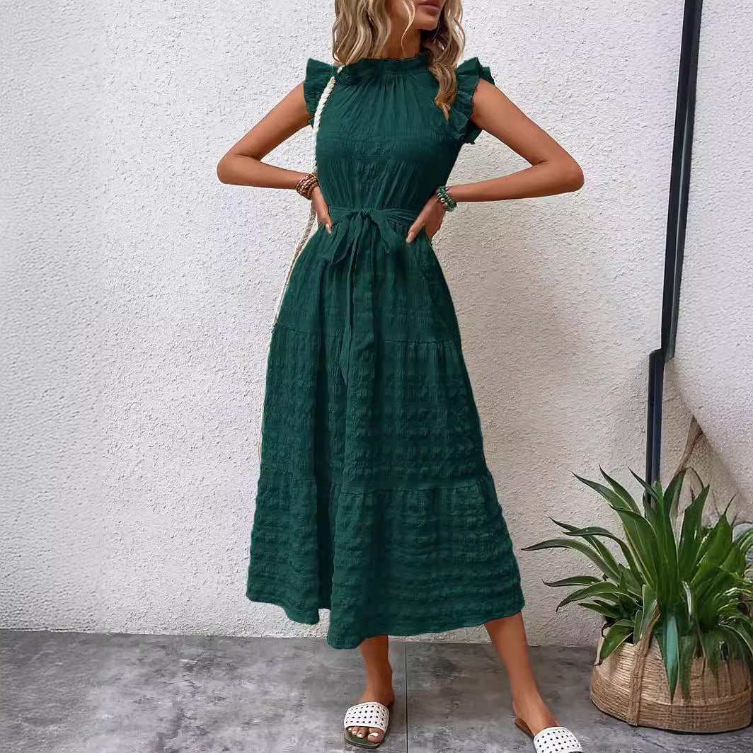 Women's wrap dress with ruffle details and a tailored hem, size