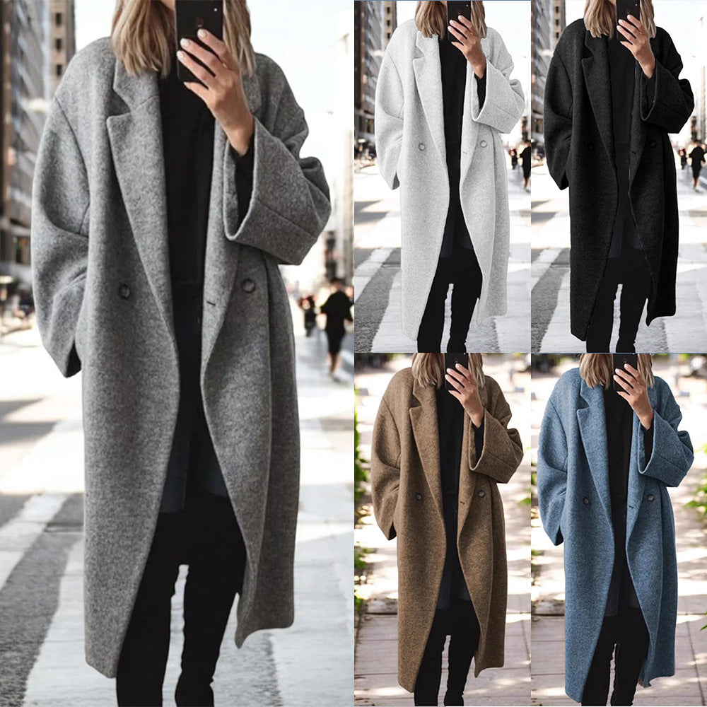 Women's oversized wool coat with an elegant cut and subtle snap buttons, size S
