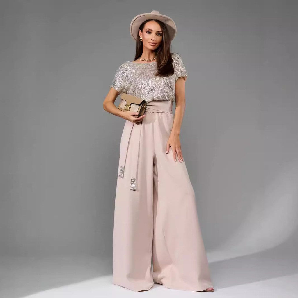 Women's glamorous jumpsuit with glittery top and wide-legged trousers, size