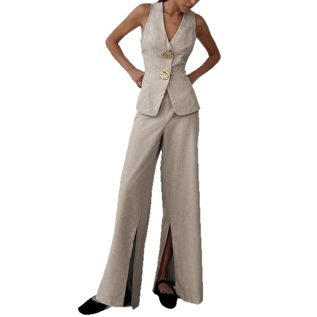 Women's elegant ensemble consisting of a sleeveless blazer and wide-leg trousers, size S